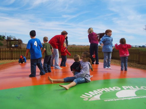 Kids and adults alike will love bouncing on the giant jumping pillow at The Walters' Farm Pumpkin Patch and Corn Maze near Wichita, Kansas.  It's the perfect place for your next company picnic, family reunion or church gathering.